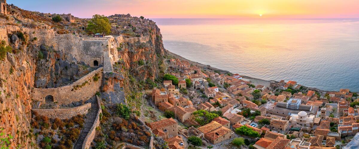 picturesque parorama old medieval castle town of Monemvasia in Lakonia at sunrise, Peloponnese, Greece. "Greek Gibraltar"