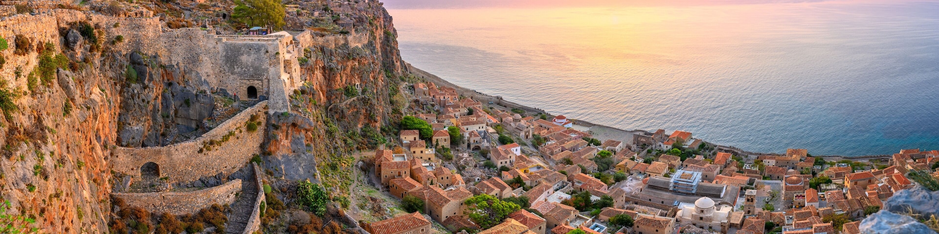 picturesque parorama old medieval castle town of Monemvasia in Lakonia at sunrise, Peloponnese, Greece. "Greek Gibraltar"