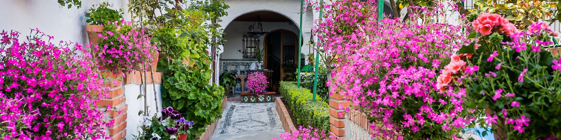 Granada, Spain - March 23, 2008 - Albaicin Neighborhood in Granada, Patio with beautiful flowers, Spain