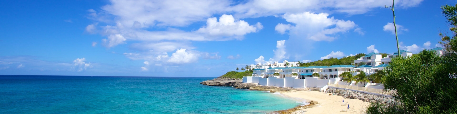 Cupecoy caracterizando paisagens litorâneas, paisagem e um hotel de luxo ou resort