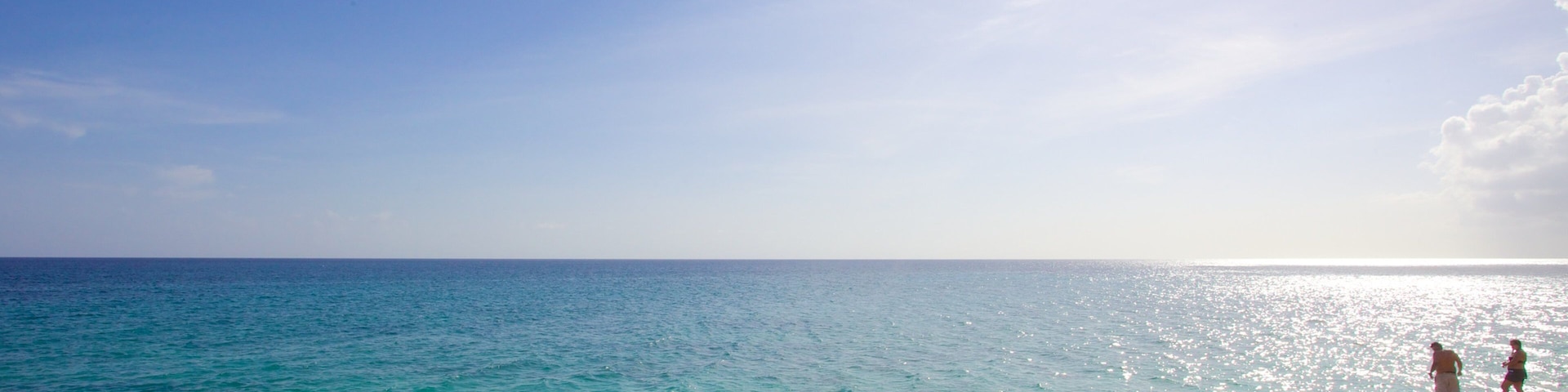 Cupecoy showing landscape views and rocky coastline