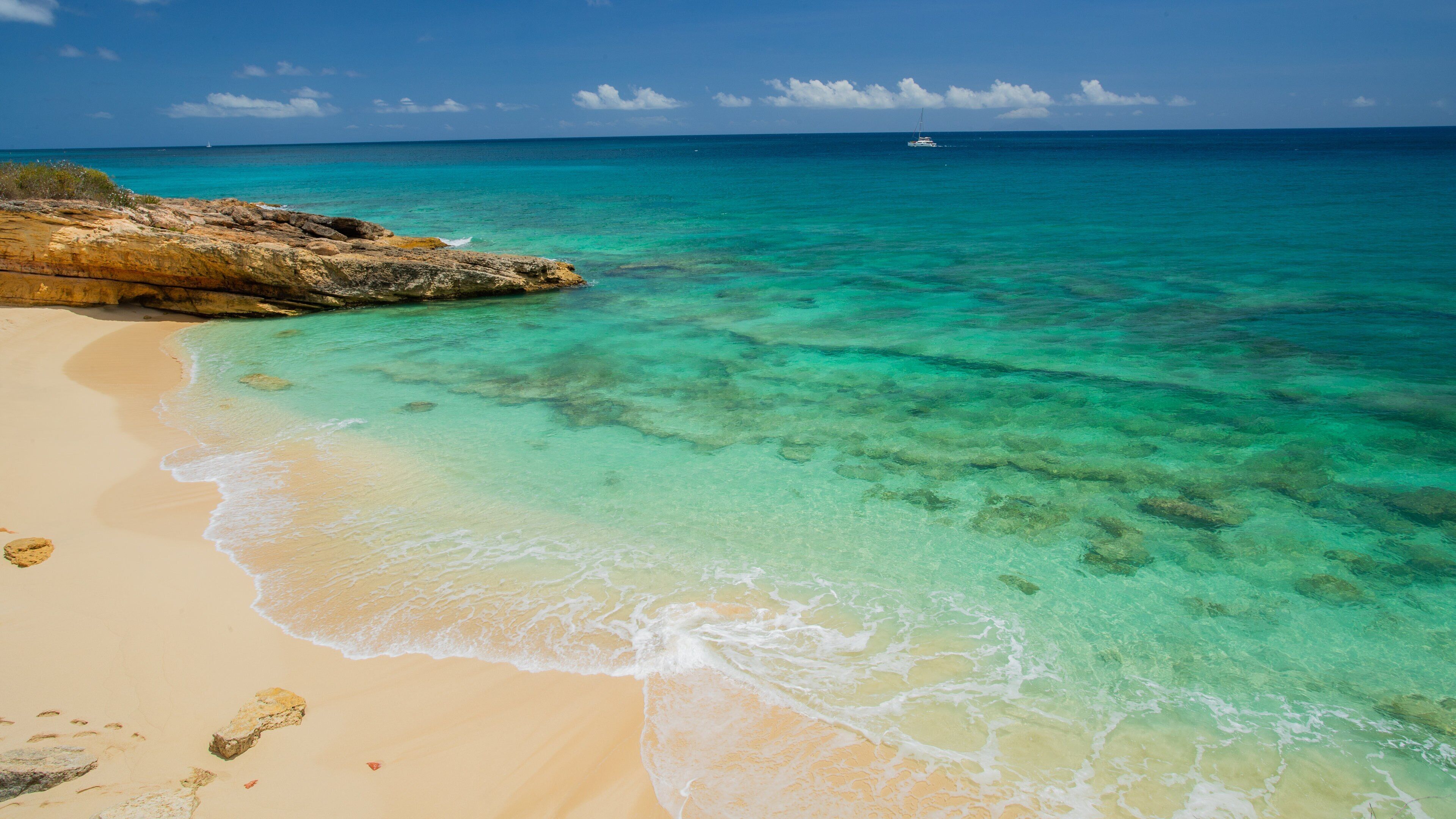 Cupecoy showing general coastal views, tropical scenes and a beach