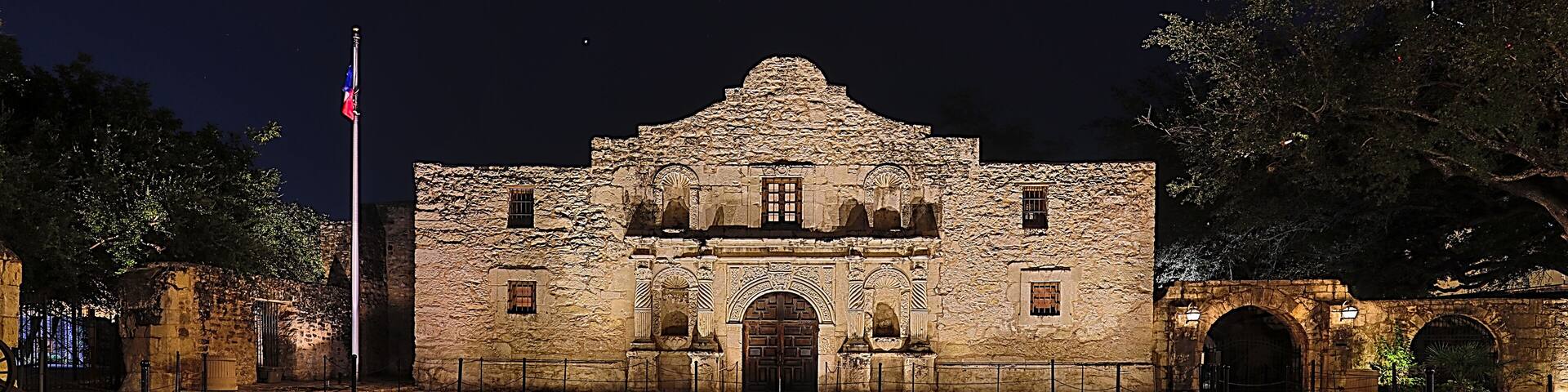 Night time view of the Alamo Mission in historic downtown San Antonio, Texas