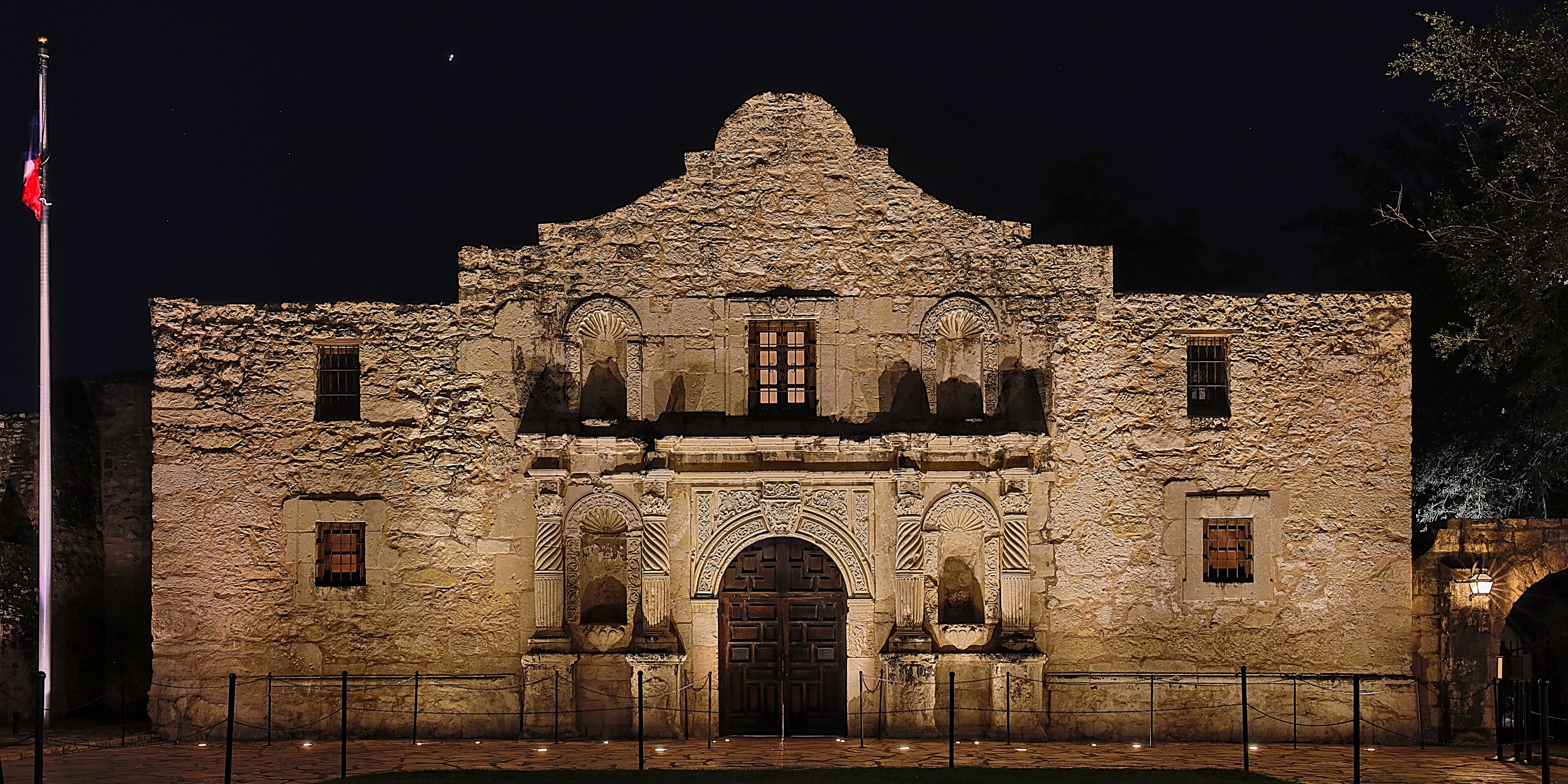 Night time view of the Alamo Mission in historic downtown San Antonio, Texas