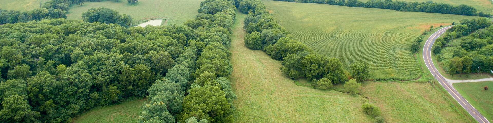 aerial view of Katy Trail shaded by trees near Pilot Grove, Missouri - 237 mile bike trail stretching across most of the state of Missouri converted from abandoned railroad