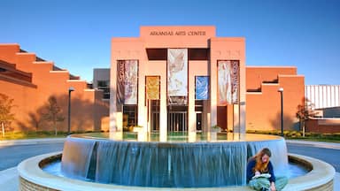 Little Rock which includes modern architecture and a fountain as well as an individual femail