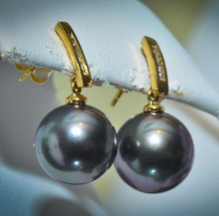 These Pearls are cultivated in the French Polynesian islands which have lagoons that are perfect for cultivating because they are surrounded by coral reefs.These reefs make for a stable environment for the oysters as they limit the rise and fall of the tide.

Buy from one of the smaller family owned shops. Don't buy from the high-falutin "galleries", the pearls are no better because they have some fancy-schmancy name associated with them.