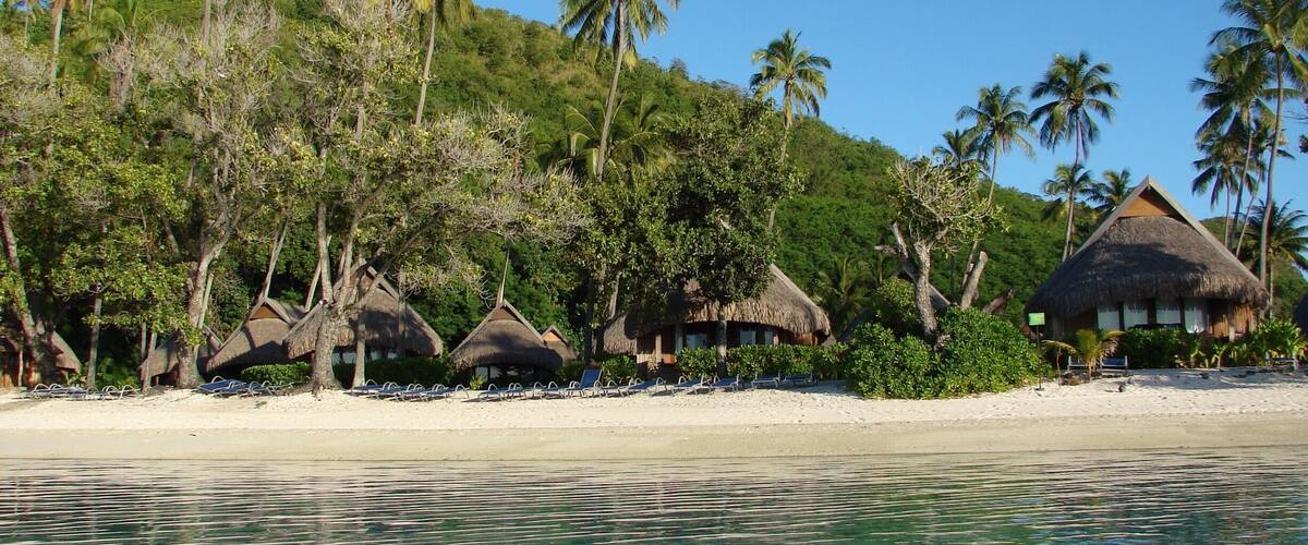 Hotels charge extra for overwater bungalows, but I prefer these. You have a beach right outside your door.