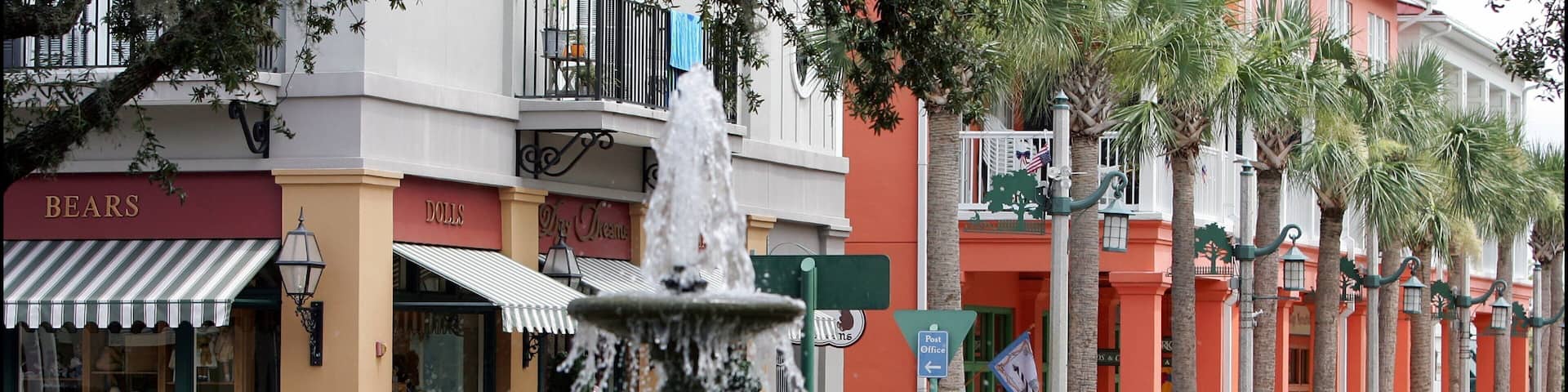 Celebration which includes a fountain, street scenes and a city