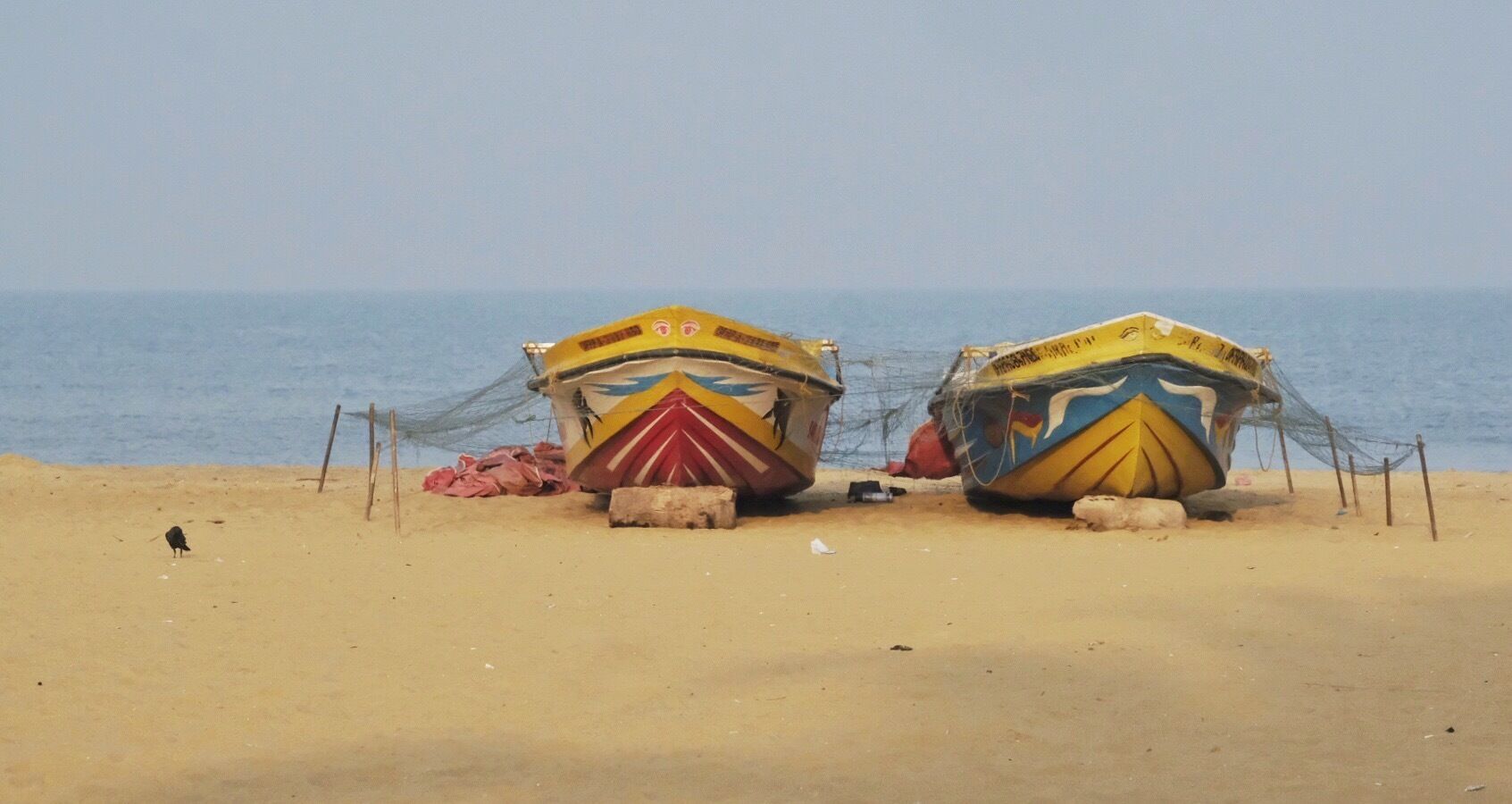 Boats among the Browns Beach in Negombo.