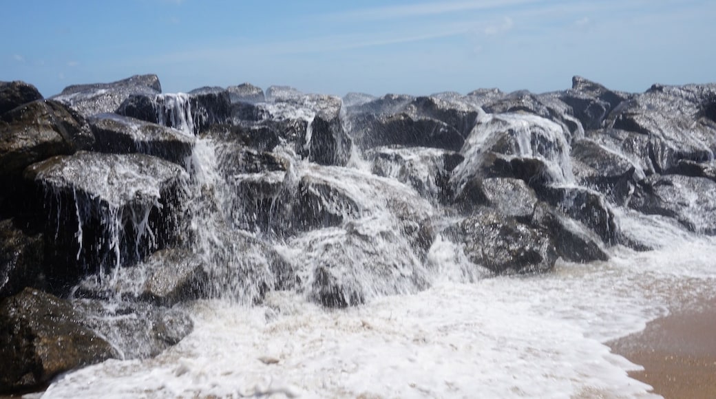 Our hotel beach in Negombo rocks at the far end beautiful sea