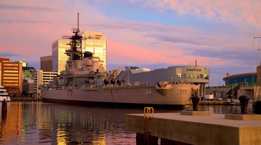 Norfolk - Virginia Beach showing a sunset, military items and a bay or harbour