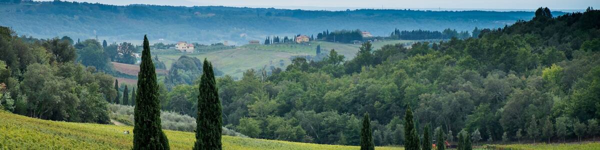 Riparbella, Livorno, Italy - October 05, 2017 - Hikers walk along the hills in Tuscany