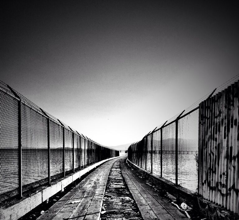 Bellingham has got one helluva classy dock... That is severely locked. This was shot though a hole in a fence.