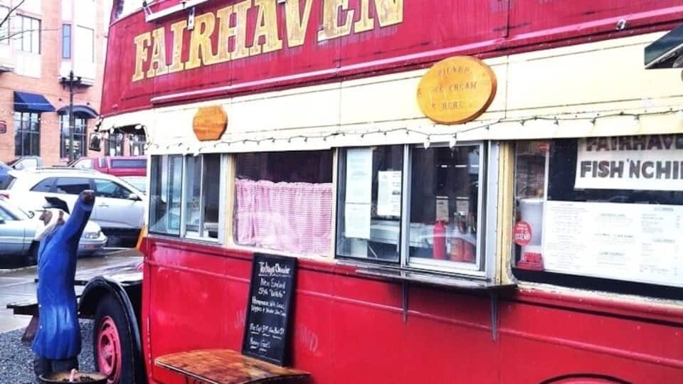 Tasty fish and chips, served out of a vintage double-decker bus swiped from the streets of London. Choices include salmon, cod, halibut or coconut prawns. Top off your meal with some soft serve ice cream - 50 flavors to choose from! Only three little tables in an attached gazebo, so be prepared to eat outdoors or take it to go.