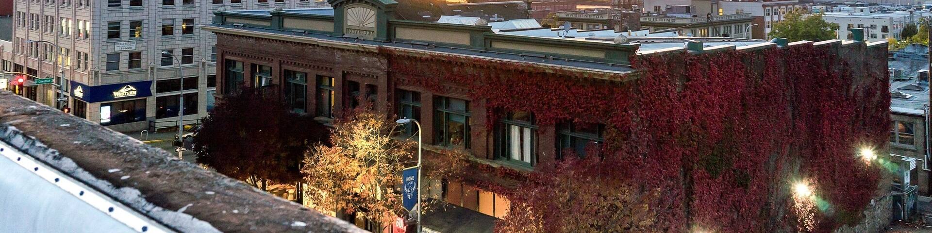 The old Herald building gets backlit as the sun sets over the San Juan islands. If your looking for some of the most beautiful sunsets find the pnw