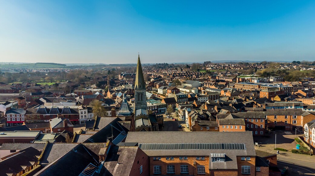 An aerial view over the rooftops of Market Harborough, UK in springtime