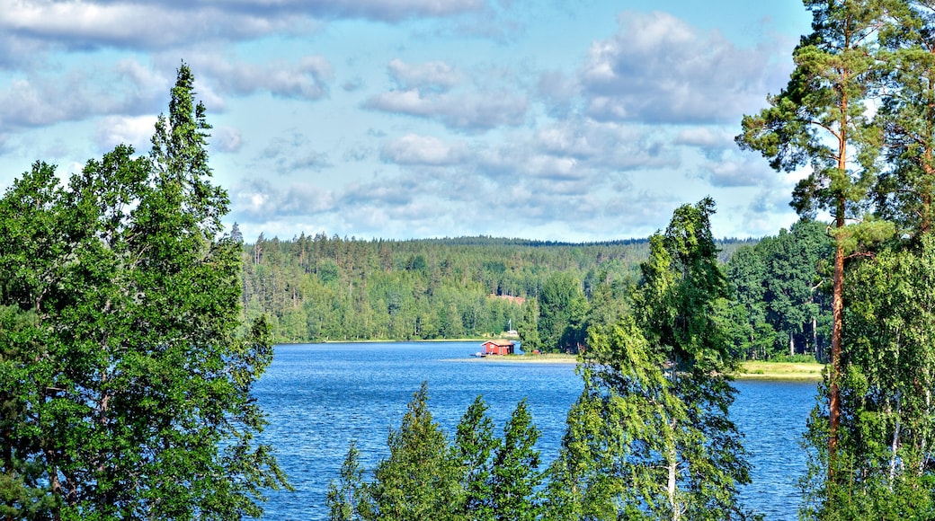summery view across the lake Gissen with bath hut near Vimmerby in the region Kalmar Län (Smaland), Sweden