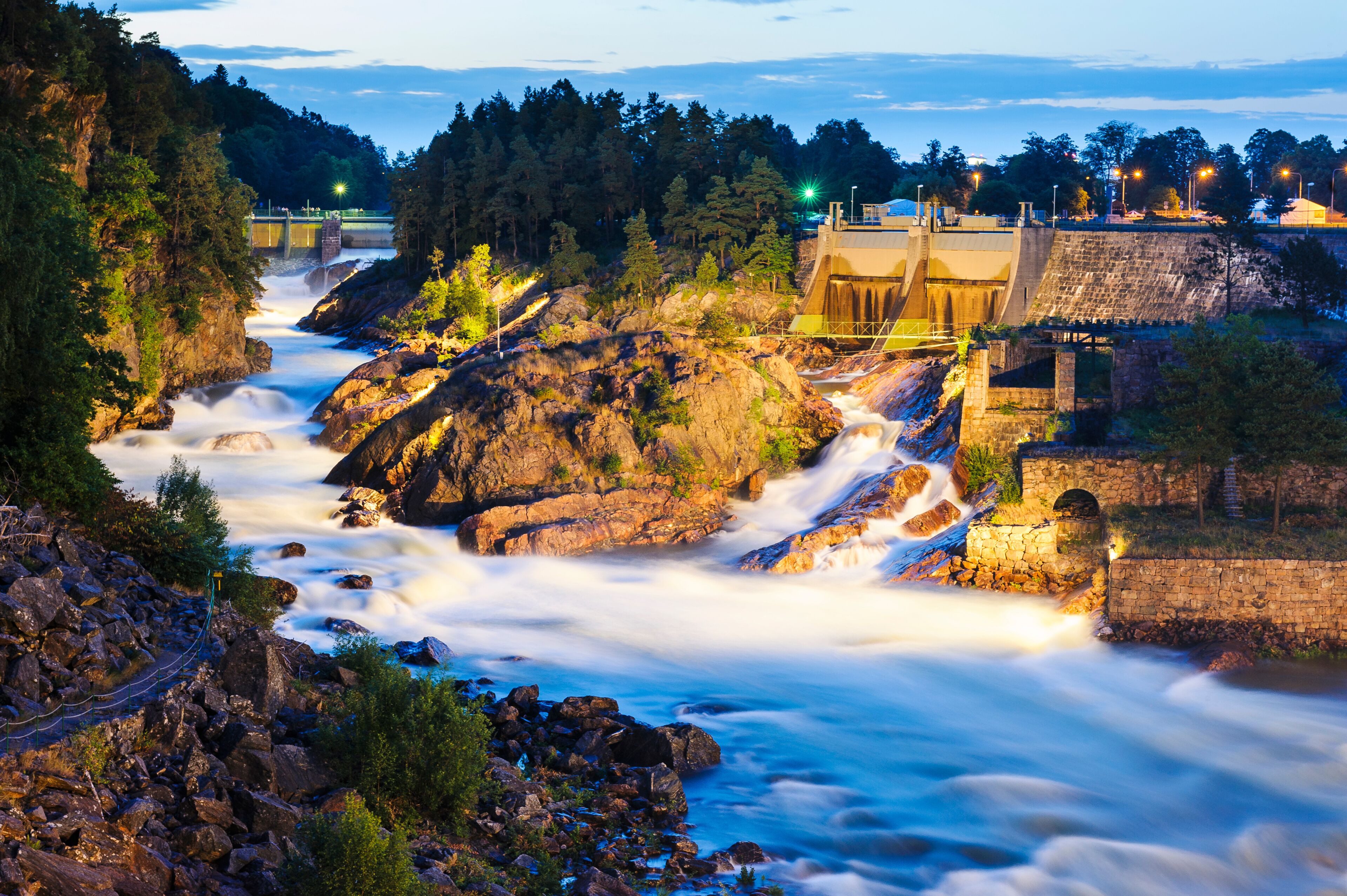 Dam on river at dusk