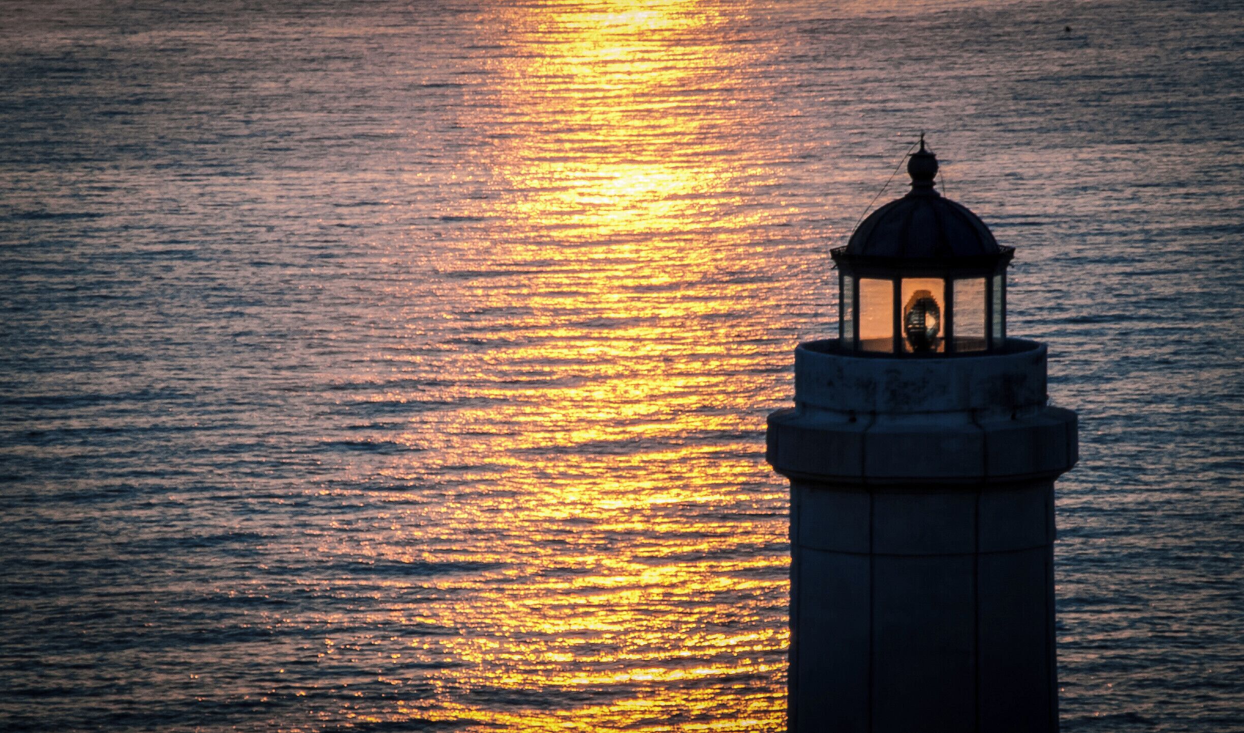 Sunrise at cape Palascìa. Cape Palascìa, commonly known as Capo d'Otranto, is Italy's most easterly point. It is situated in the territory of the Apulian city of Otranto, in the Province of Lecce at 40° 7' northing and 18° 31' easting.
The lighthouse there, recently renovated, is one of five Mediterranean lighthouses protected by the European Commission. It is often visited by tourists, especially at New Year, since it stands at the point where the dawn of the new year may first be seen in Italy.
According to nautical conventions, Capo d'Otranto marks the point where the Ionian Sea and the Adriatic Sea meet.