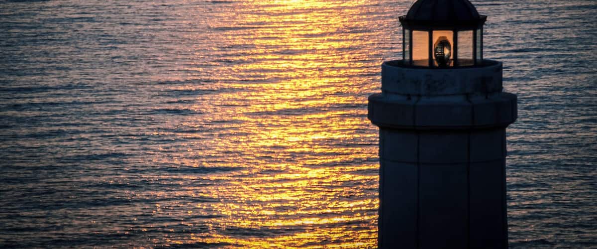 Sunrise at cape Palascìa. Cape Palascìa, commonly known as Capo d'Otranto, is Italy's most easterly point. It is situated in the territory of the Apulian city of Otranto, in the Province of Lecce at 40° 7' northing and 18° 31' easting.
The lighthouse there, recently renovated, is one of five Mediterranean lighthouses protected by the European Commission. It is often visited by tourists, especially at New Year, since it stands at the point where the dawn of the new year may first be seen in Italy.
According to nautical conventions, Capo d'Otranto marks the point where the Ionian Sea and the Adriatic Sea meet.