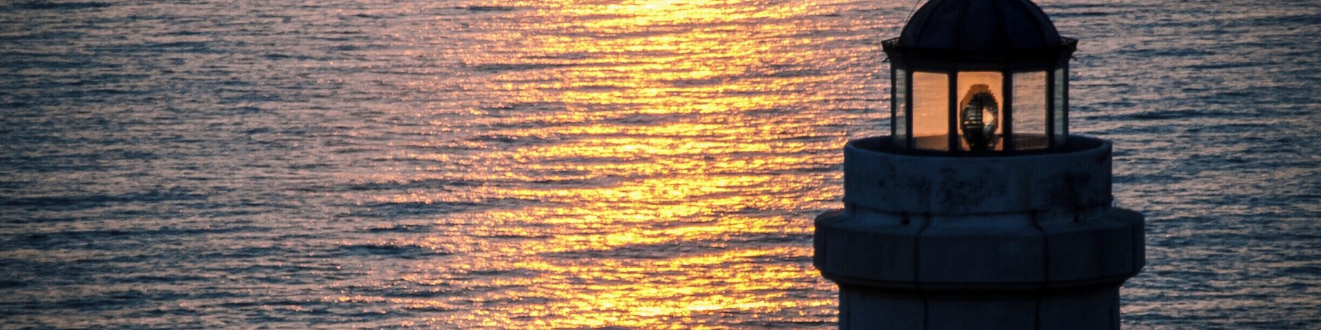 Sunrise at cape Palascìa. Cape Palascìa, commonly known as Capo d'Otranto, is Italy's most easterly point. It is situated in the territory of the Apulian city of Otranto, in the Province of Lecce at 40° 7' northing and 18° 31' easting.
The lighthouse there, recently renovated, is one of five Mediterranean lighthouses protected by the European Commission. It is often visited by tourists, especially at New Year, since it stands at the point where the dawn of the new year may first be seen in Italy.
According to nautical conventions, Capo d'Otranto marks the point where the Ionian Sea and the Adriatic Sea meet.