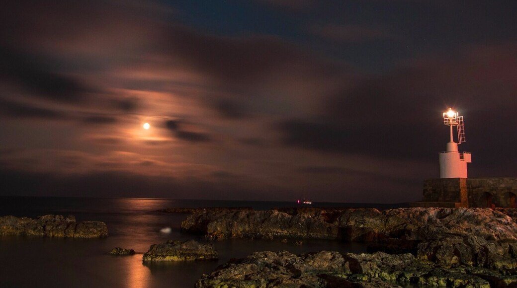 The lighthouse and the moon