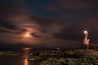 The lighthouse and the moon