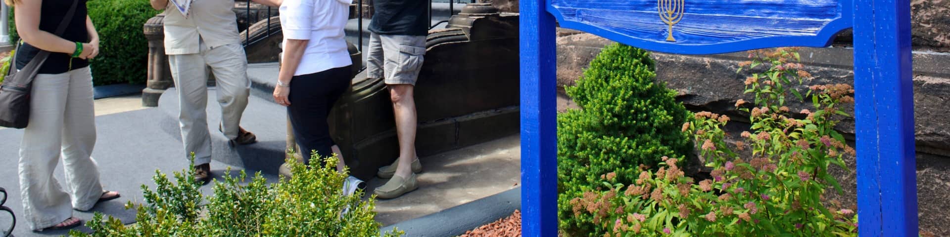 Saint John which includes signage as well as a small group of people