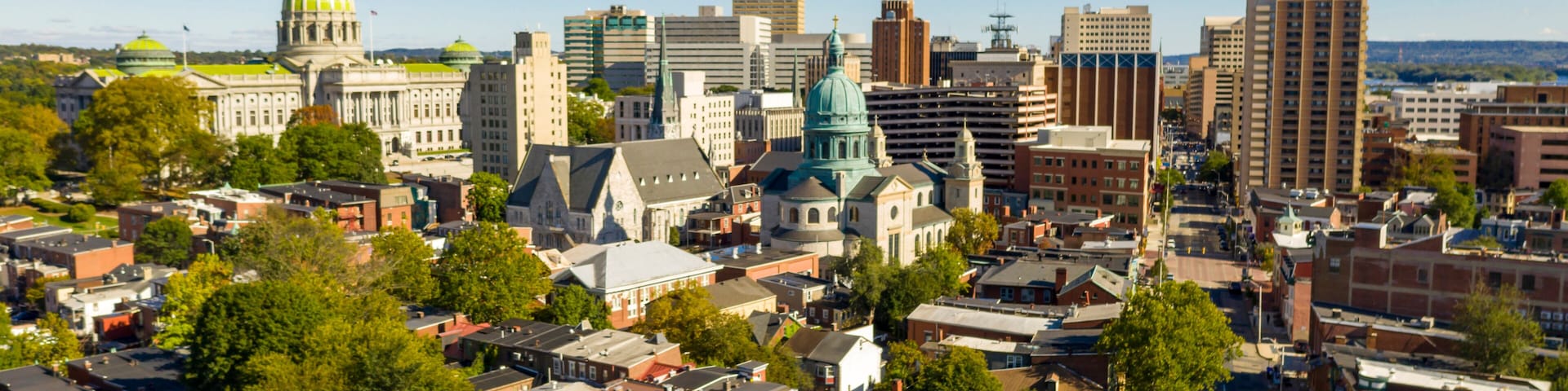 Afternoon light hits the buildings and downtown city center area in Pennsylvania state capital at Harrisburg