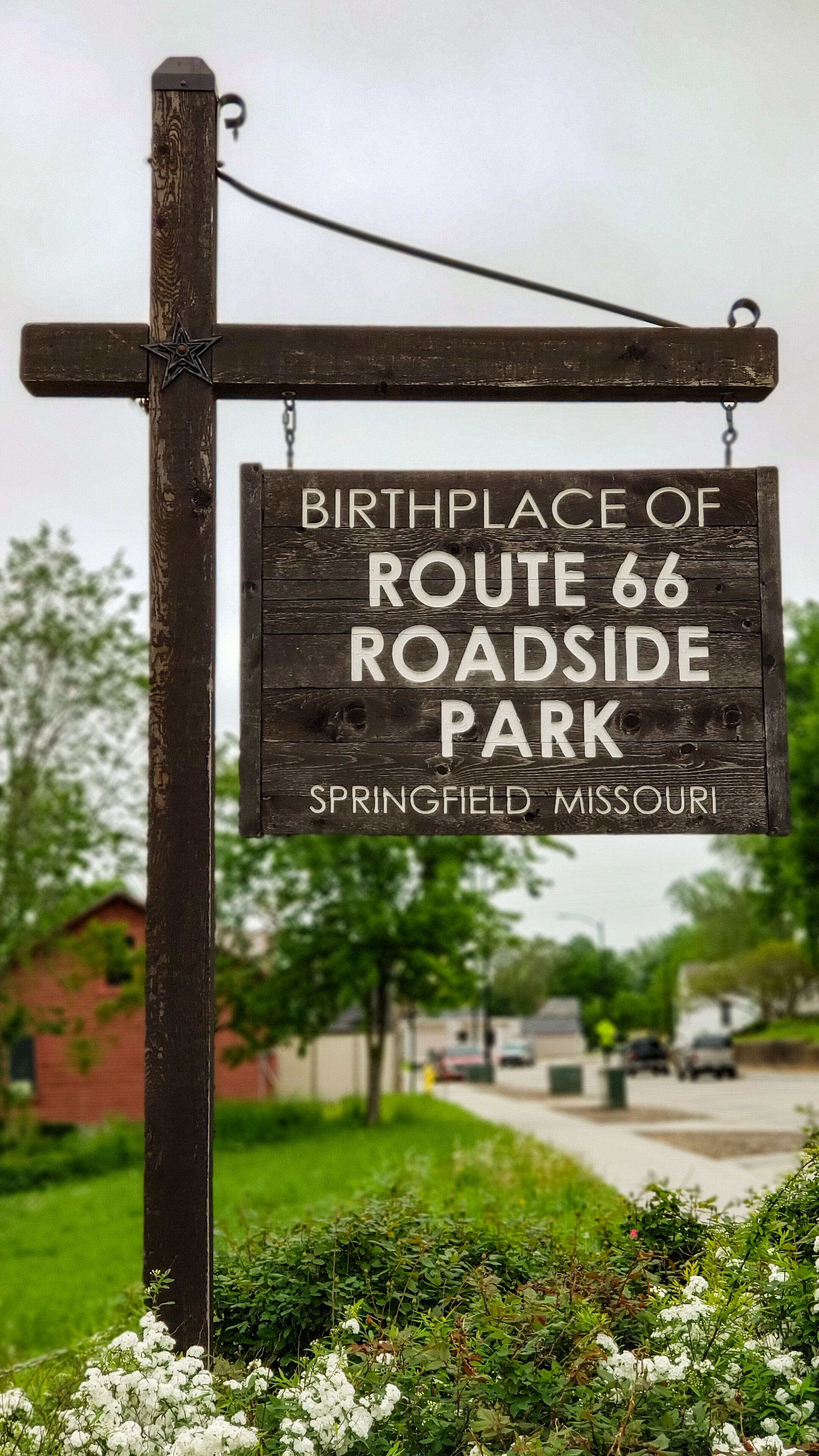 Not much to see here or do here, some street sign in the opposite sidewalk