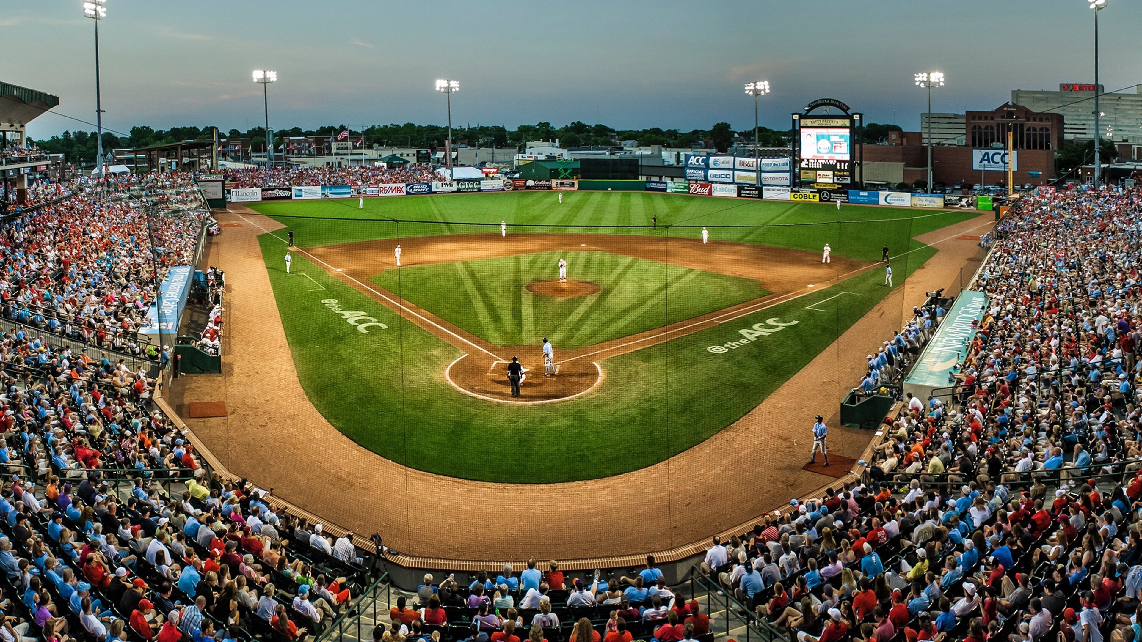 Greensboro featuring a sporting event as well as a large group of people