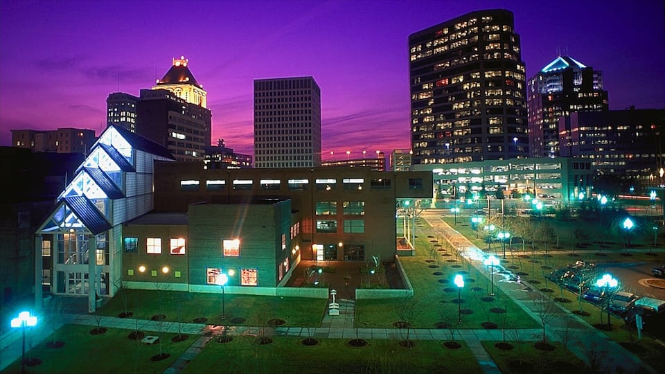 Greensboro showing modern architecture, night scenes and a city