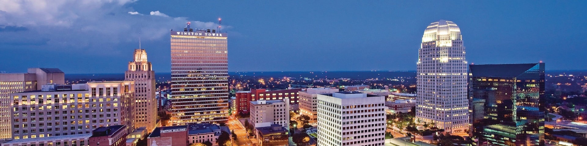 Winston - Salem featuring a city and night scenes