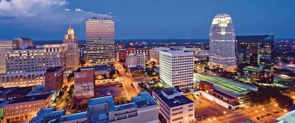 Winston - Salem showing night scenes and a city