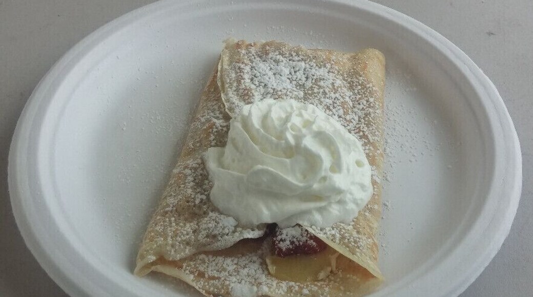 "The Crush" crepe from Crepe Boheme inside of the the PNC 2nd street market. Beneath the whipped cream and powdered sugar, stuffed inside the delicate crepe batter resides a curious concoction of fresh raspberries, quince paste and melted smoked brie.