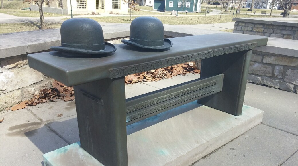 "Whose gift of powered flight lifted our world forever skyward."
A bronze bench tribute to the Wright Brothers.