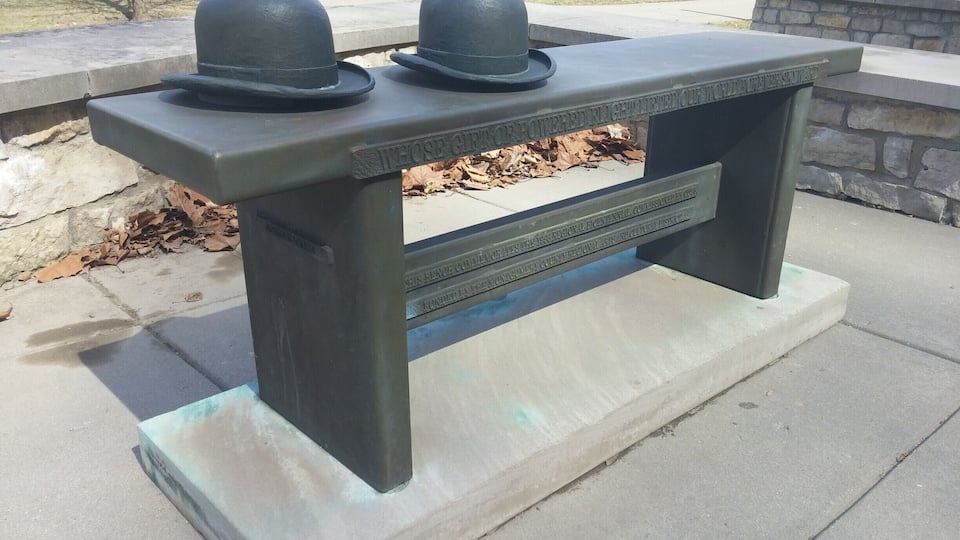 "Whose gift of powered flight lifted our world forever skyward."
A bronze bench tribute to the Wright Brothers.