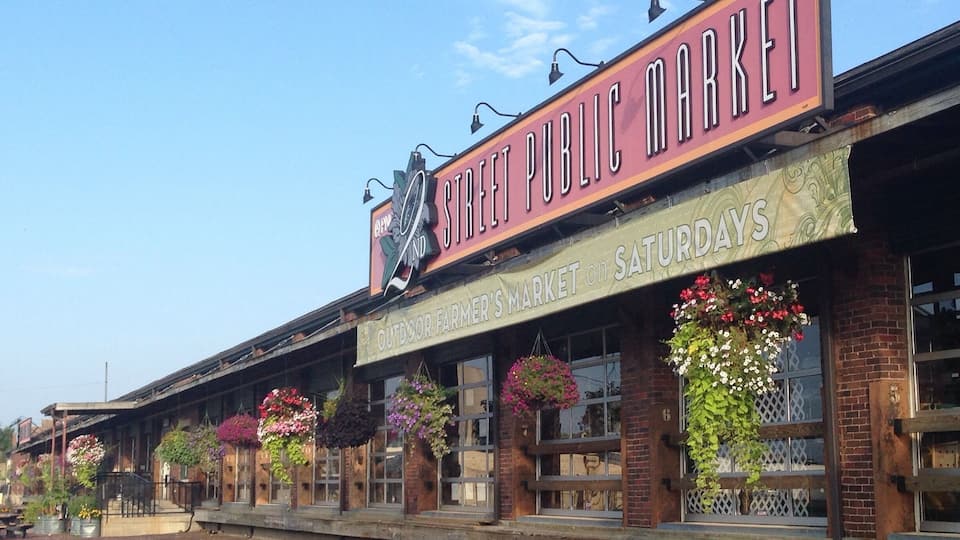 This nifty metropark in downtown Dayton is a combination of farmer's market and local craft sale with food stands. It's only open Thursday - Saturday. Great place to pick up some local produce or dairy or honey, get some lunch while enjoying live music, and find a couple nifty local knick-knacks. It is inside the building (some stalls sprawl into the parking lot when the weather is nice) so rain or shine doesn't matter, and no pups.