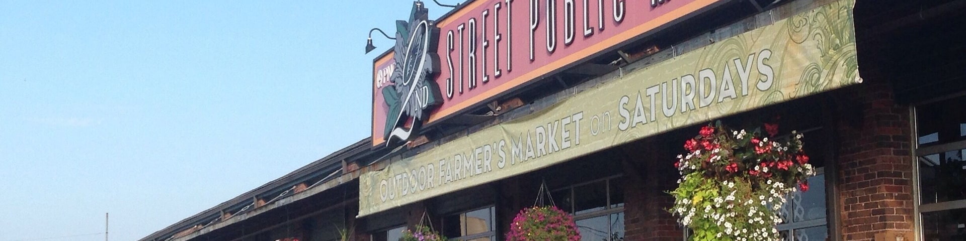 This nifty metropark in downtown Dayton is a combination of farmer's market and local craft sale with food stands. It's only open Thursday - Saturday. Great place to pick up some local produce or dairy or honey, get some lunch while enjoying live music, and find a couple nifty local knick-knacks. It is inside the building (some stalls sprawl into the parking lot when the weather is nice) so rain or shine doesn't matter, and no pups.