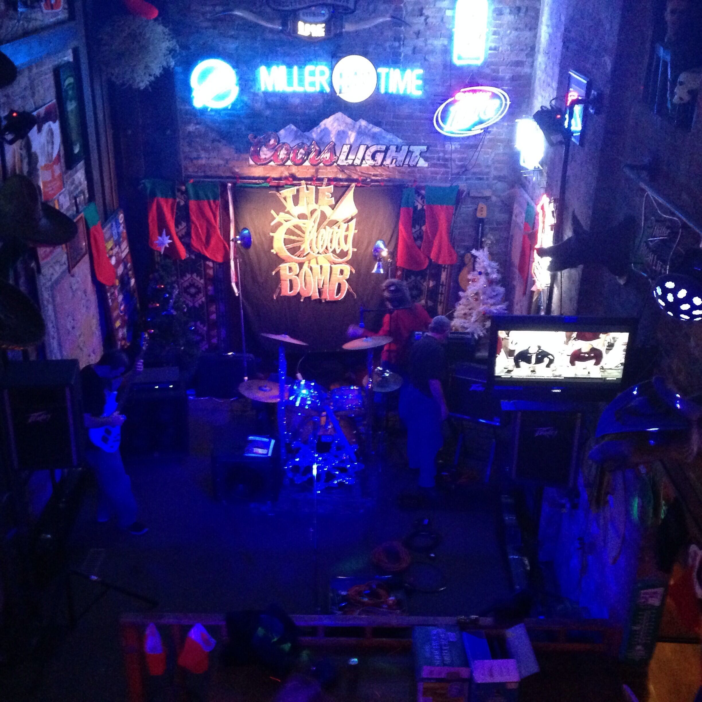 Tumbleweed is one of the many funky bars in Dayton's historic Oregon District.  The decor is bizarre and you'll probably spot something new and entertaining every time you're there, no matter how many times that's been!  There's a small second story area which affords a great view of the stage (pictured), where they've got live music several days a week.  There's also an outdoor deck which is open in the summer and plastic-wrapped in winter so the smokers can still use it.  No draft beers, but plenty of bottled options and other drinks!