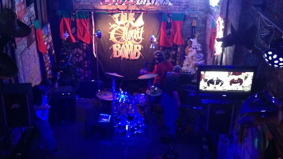 Tumbleweed is one of the many funky bars in Dayton's historic Oregon District. The decor is bizarre and you'll probably spot something new and entertaining every time you're there, no matter how many times that's been! There's a small second story area which affords a great view of the stage (pictured), where they've got live music several days a week. There's also an outdoor deck which is open in the summer and plastic-wrapped in winter so the smokers can still use it. No draft beers, but plenty of bottled options and other drinks!