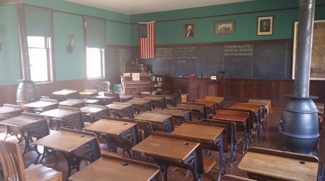 Locust Grove School No. 12 built in 1896 served as a one room school house near Springfield OH. The building has been moved and rebuilt inside Carillon Historical Park complete with the rope that rings the bell!