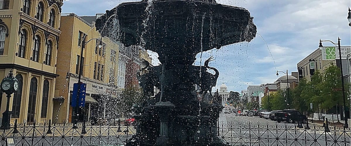 Almost make it seem as if you are in old Europe, but this beautiful fountain dating back to 1885 stands in atop an artesian well in the center of old town Montgomery, AL. Barely noticeable Directly behind and less than a mile past the fountain is the Alabama State Capitol.
