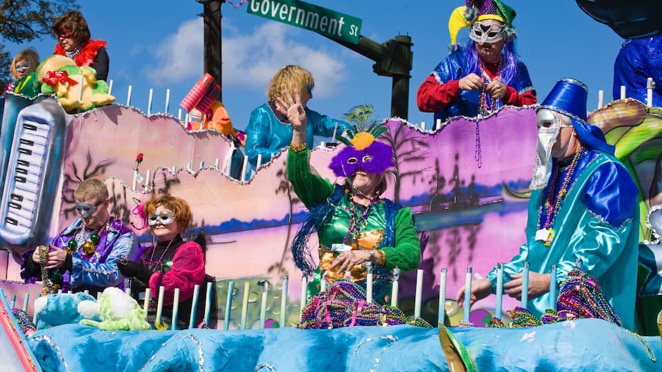 Mobile which includes a festival as well as a small group of people