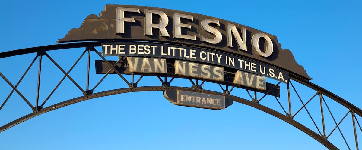 A vintage sign for Fresno, stating "The Best Little City in the U.S.A. on Van Ness Ave."