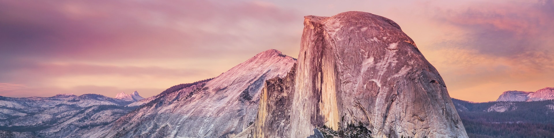 A mountain with a prominent rock formation.