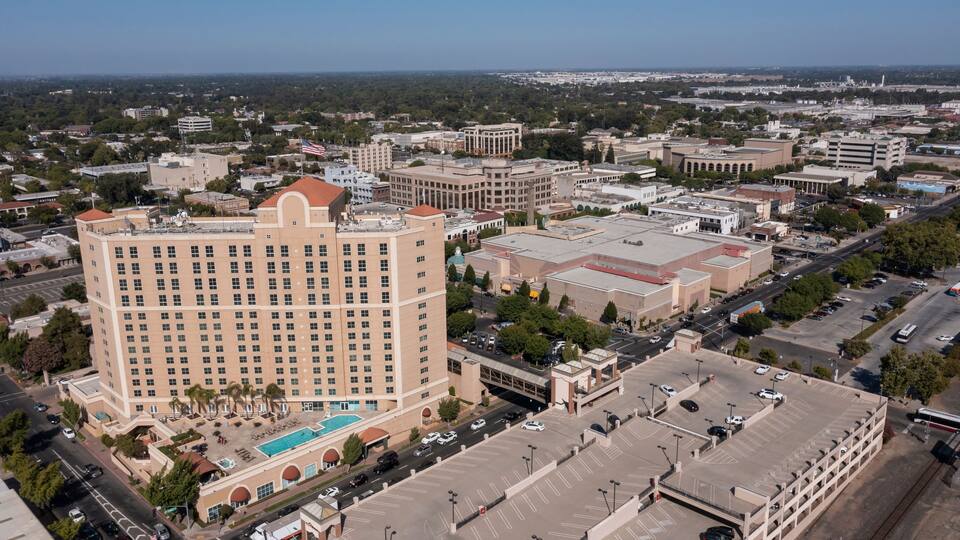 Afternoon aerial view of the urban downtown core of Modesto, California, USA.