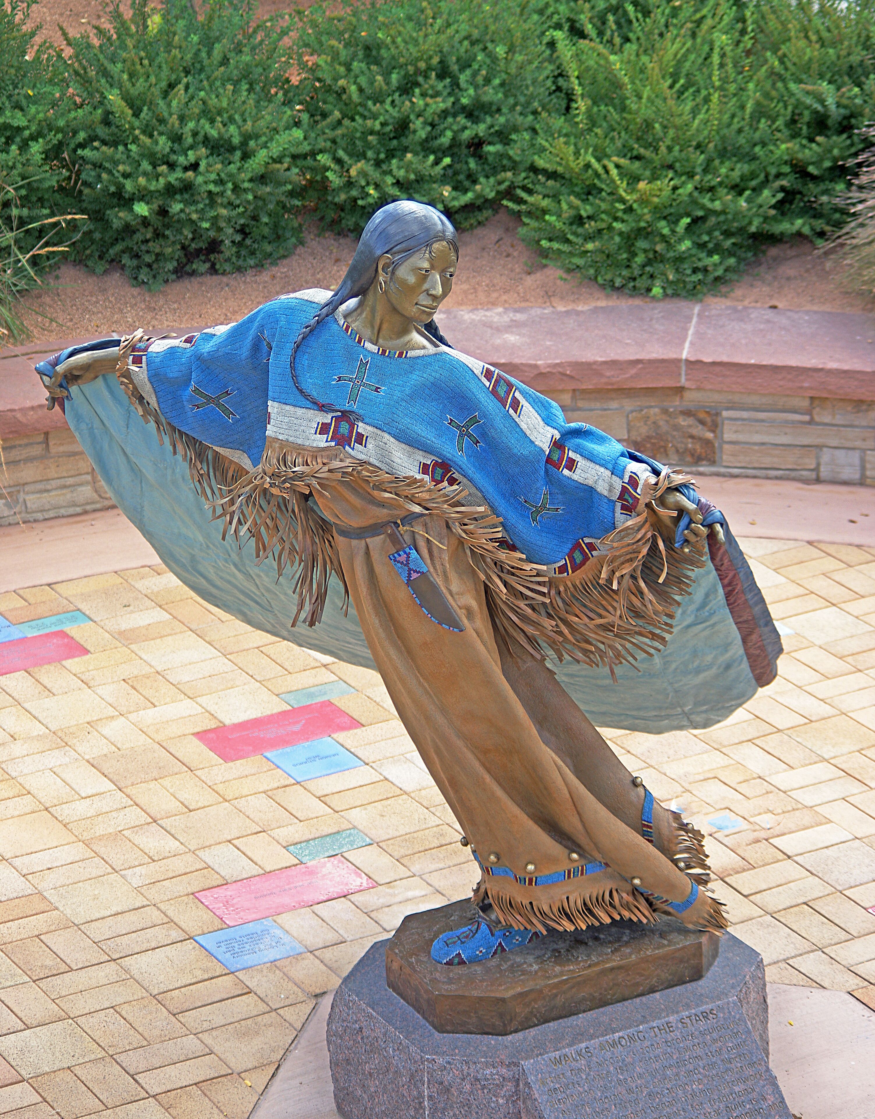 Statue of a Indian woman along the river trail. The detail in her cape is amazing.