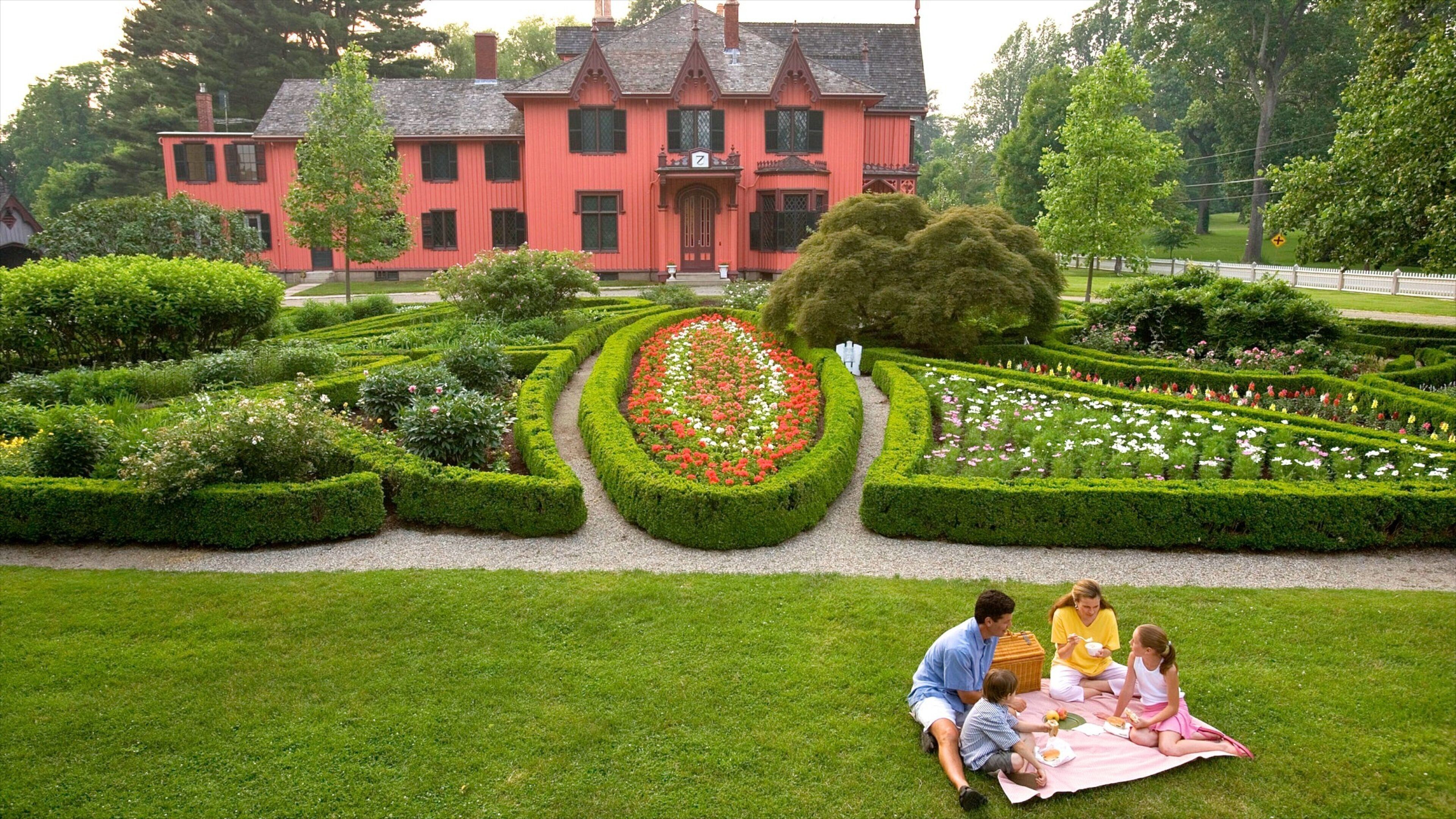 Mystic showing flowers, a garden and a house